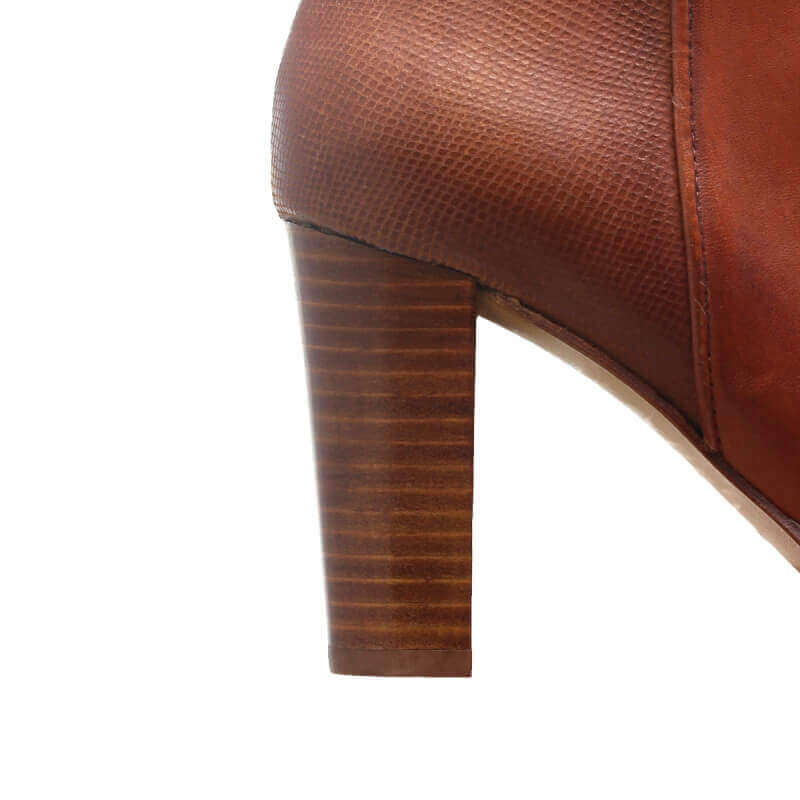 Remplacement enveloppe talons cuir Remplacement enveloppe talons cuir
